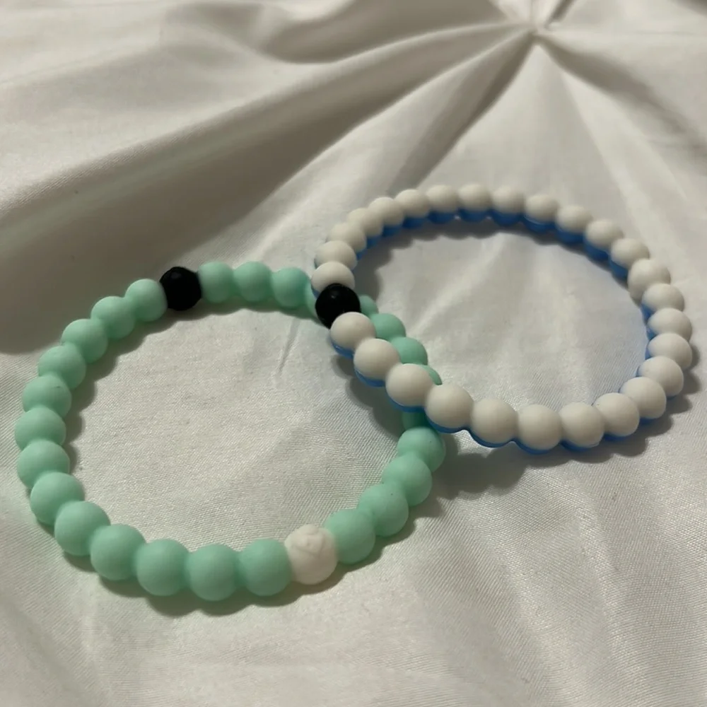 2 Lokai Bracelets
